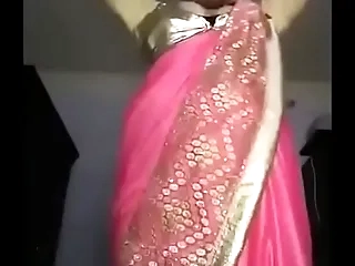 Indian Girl strips while talking dirty